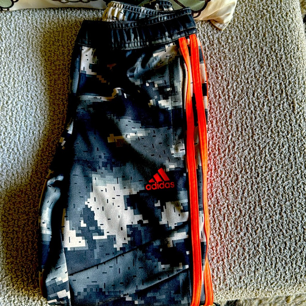 Camo and orange adidas training pants